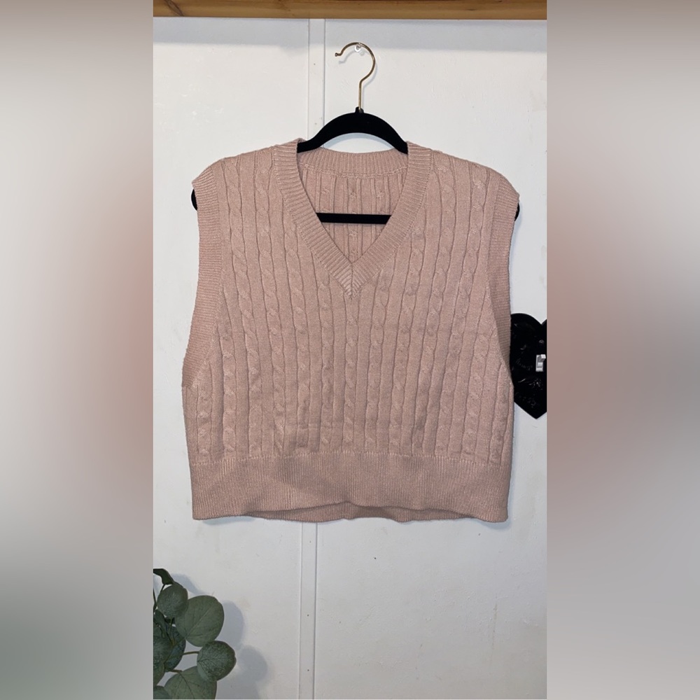 Pink sweater vest